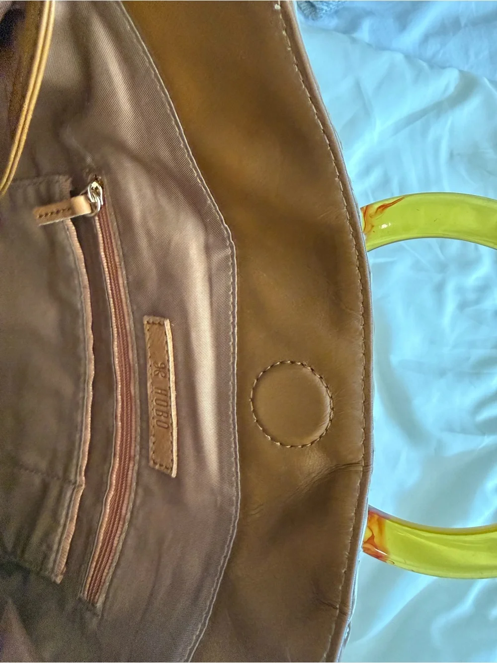 HOBO Straw Bucket Bag with Amber Resin Ring Handles